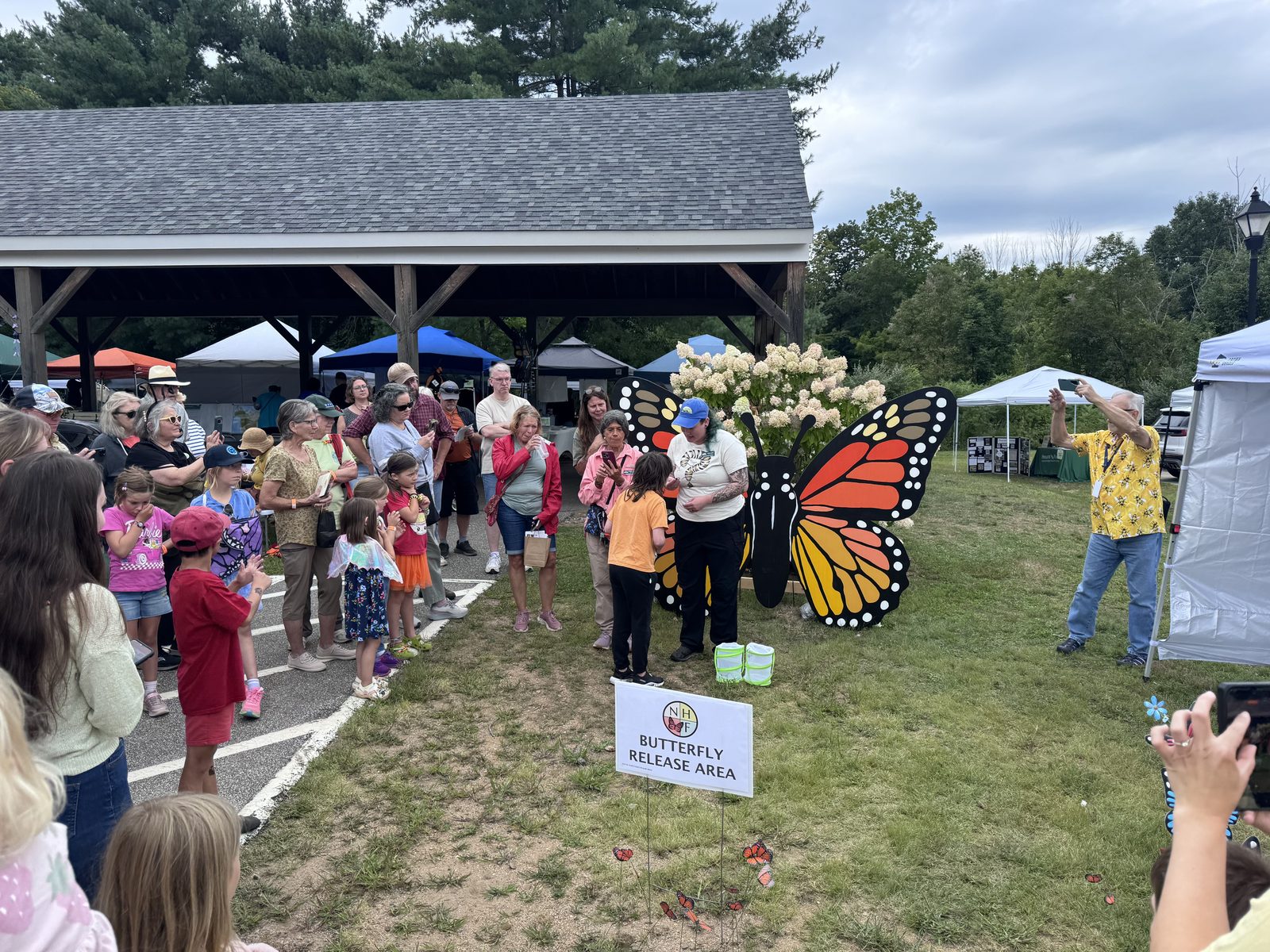 Crowd gathered at the butterfly release area